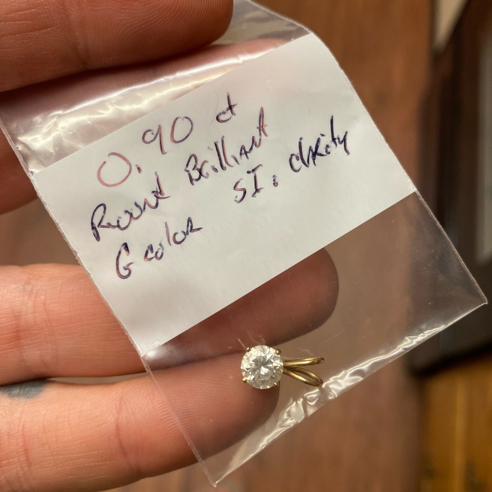 Clear almost perfect Diamond in gold pendant. Can take out and put in a ring.